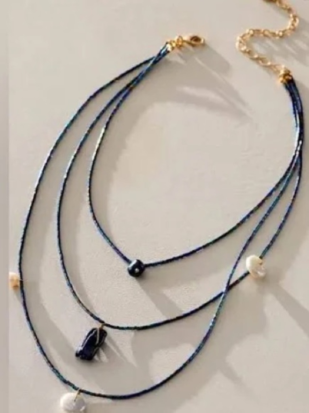Free people Ariana Ost celebrate layer neclace